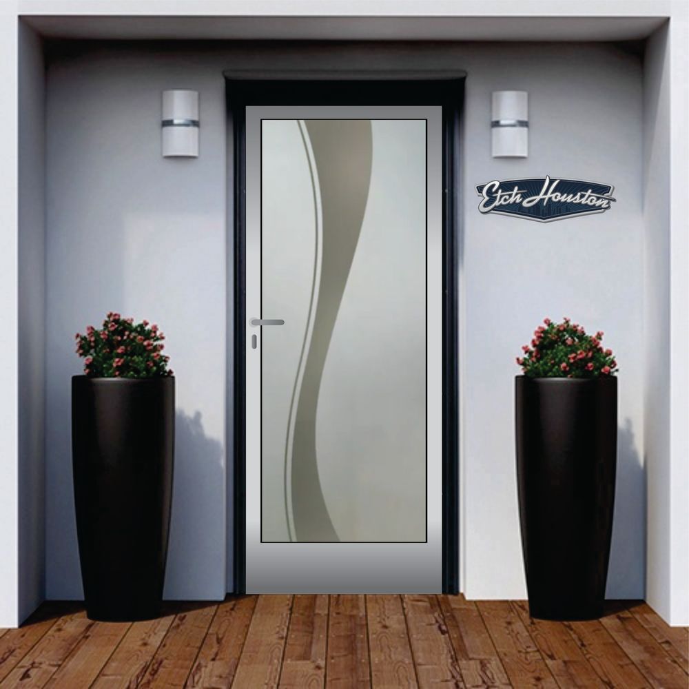 An entrance door with a decorative glass panel carrying a single tall S-shaped wave, between two tall black planters.