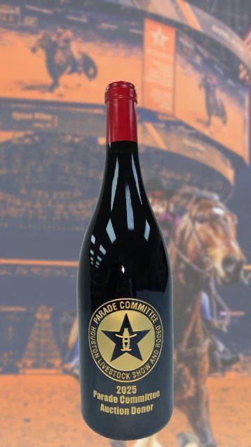 A red-capped bottle carrying the same gold Parade Committee Auction Donor medallion.